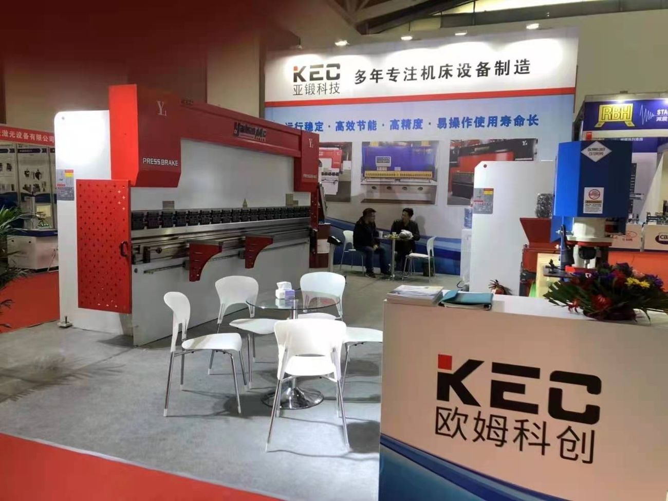 KECMT exhibition booth with a press brake running demonstrations