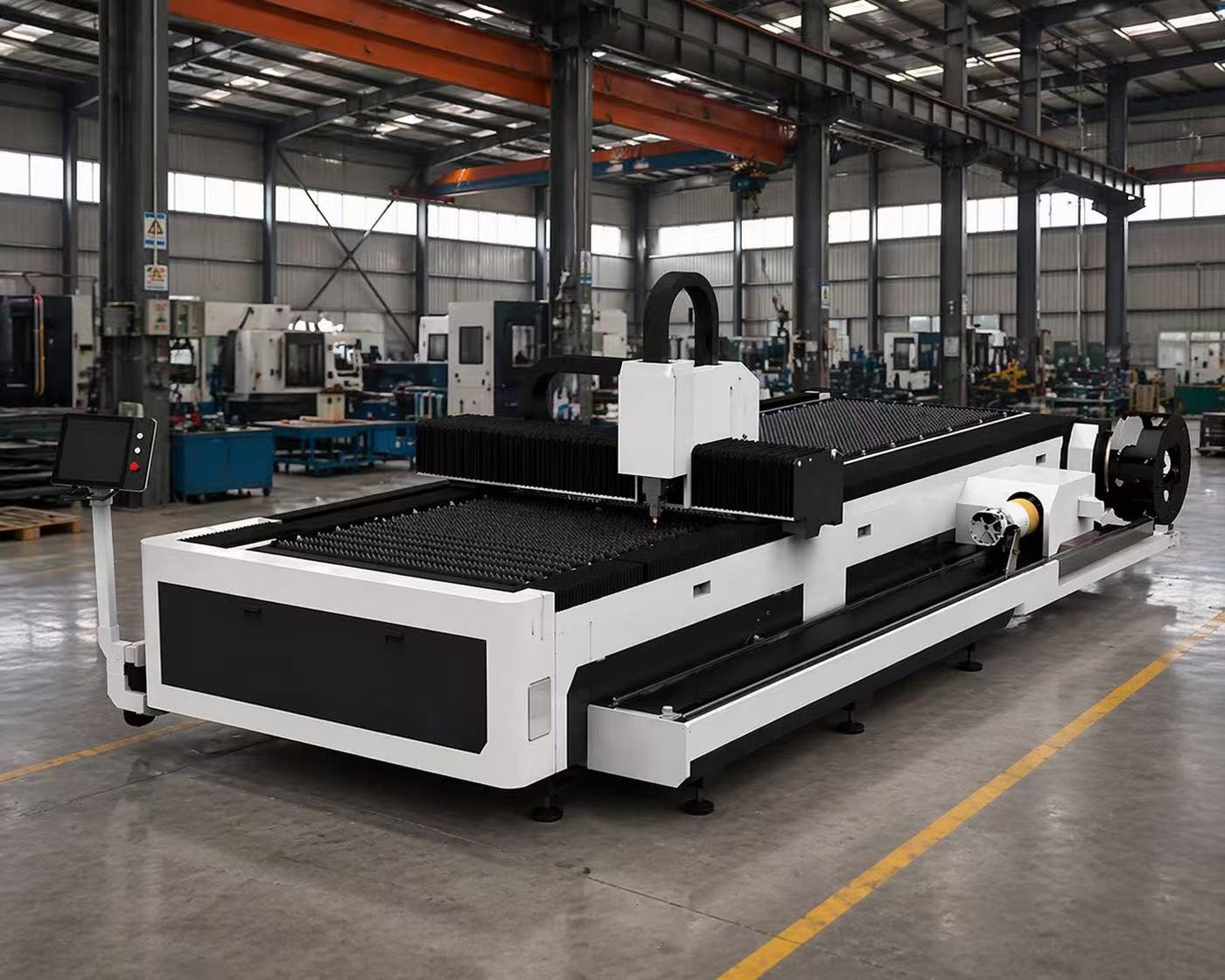 Open platform fiber laser cutting machine with gantry and cutting head in a sheet metal workshop