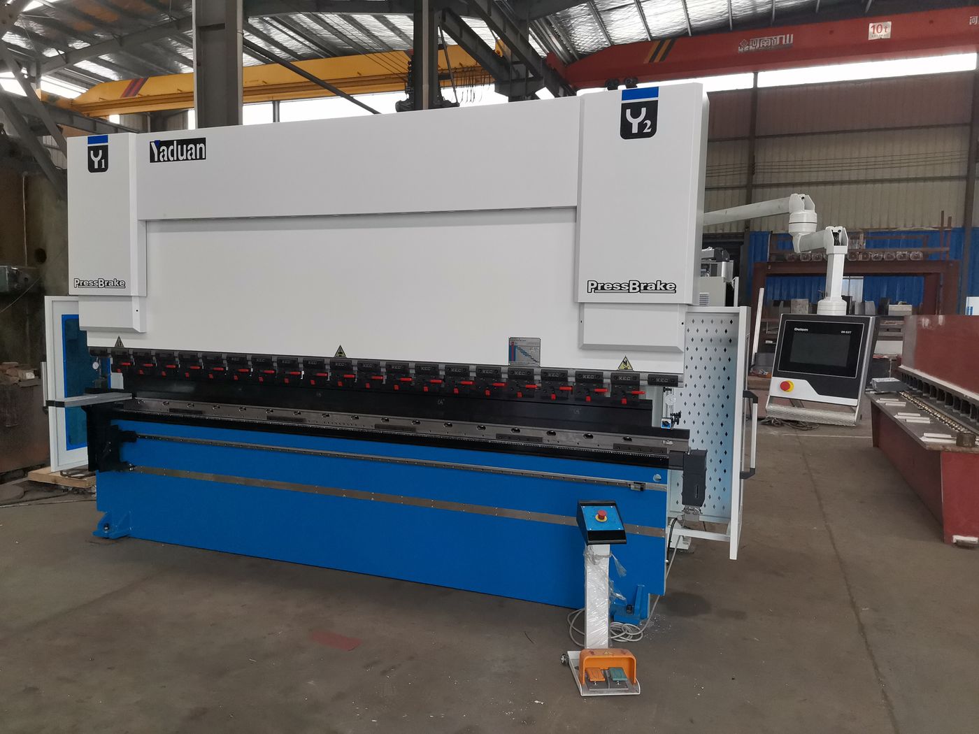Yaduan press brake with CNC control panel in the workshop