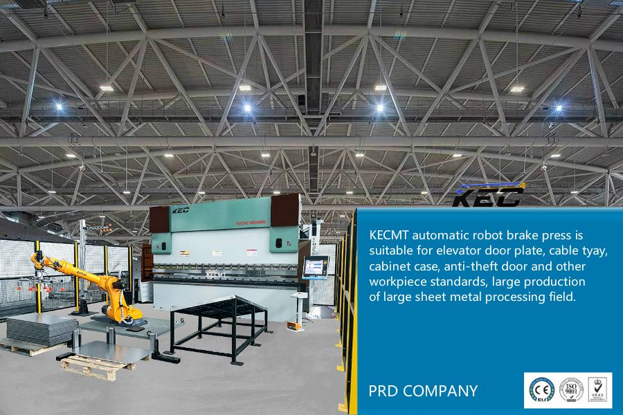 Robotic press brake cell with a 6-axis robot arm loading blanks into a CNC press brake in a large fabrication hall