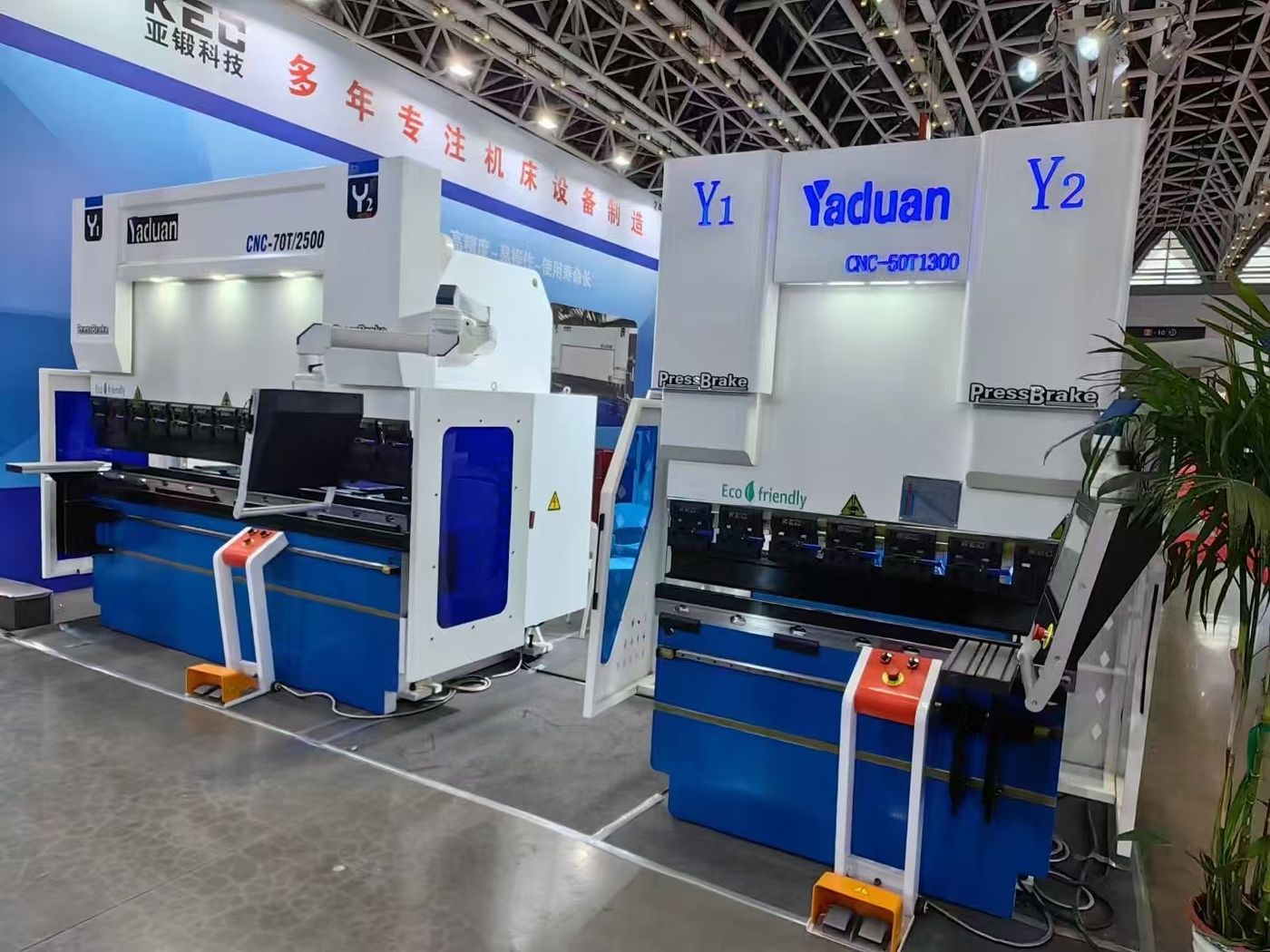 Close view of a CNC press brake on the KECMT stand